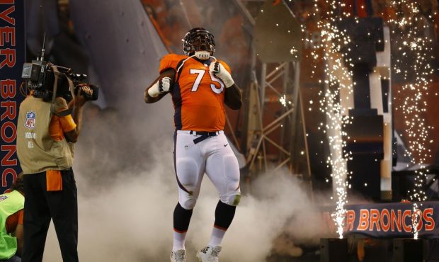 DENVER, CO - SEPTEMBER 11:  Offensive tackle Menelik Watson #75 of the Denver Broncos is introduced...