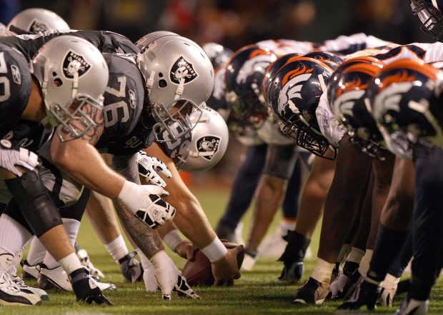 Oakland Raiders players during a match against the Denver Broncos