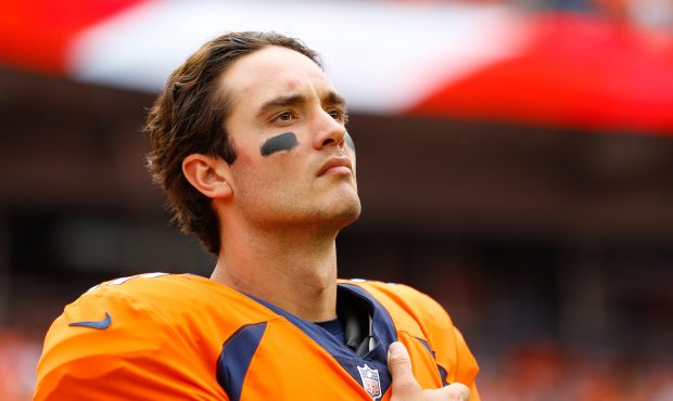 Quarterback Brock Osweiler #17 of the Denver Broncos looks on before a game against the Dallas Cowb...