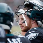 PHILADELPHIA, PA - NOVEMBER 05:  Quarterback Carson Wentz #11 of the Philadelphia Eagles looks on from the sidelines as they take on the Denver Broncos during the first quarter at Lincoln Financial Field on November 5, 2017 in Philadelphia, Pennsylvania.  (Photo by Joe Robbins/Getty Images)