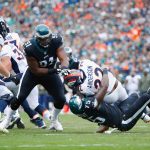 PHILADELPHIA, PA - NOVEMBER 05: Running back C.J. Anderson #22 of the Denver Broncos is tackled by defensive end Vinny Curry #75 of the Philadelphia Eagles during the first quarter at Lincoln Financial Field on November 5, 2017 in Philadelphia, Pennsylvania.  (Photo by Joe Robbins/Getty Images)