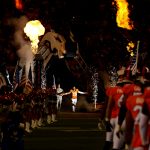 DENVER, CO - NOVEMBER 12:  Cornerback Chris Harris #25 of the Denver Broncos runs onto the field during player introductions before a game against the New England Patriots at Sports Authority Field at Mile High on November 12, 2017 in Denver, Colorado. (Photo by Justin Edmonds/Getty Images)
