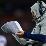 DENVER, CO - NOVEMBER 12:  Head coach Bill Belichick of the New England Patriots reviews a printout on the sideline during a game at Sports Authority Field at Mile High on November 12, 2017 in Denver, Colorado. (Photo by Dustin Bradford/Getty Images)