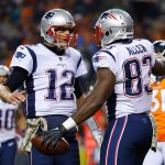 DENVER, CO - NOVEMBER 12:  Tight end Dwayne Allen #83 of the New England Patriots celebrates with Tom Brady #12 after scoring a second quarter touchdown against the Denver Broncos at Sports Authority Field at Mile High on November 12, 2017 in Denver, Colorado. (Photo by Justin Edmonds/Getty Images)