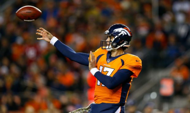 Quarterback Brock Osweiler #17 of the Denver Broncos passes against the New England Patriots in the...
