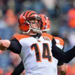 DENVER, CO - NOVEMBER 19:  Quarterback Andy Dalton #14 of the Cincinnati Bengals throws as he warms up before a game against the Denver Broncos at Sports Authority Field at Mile High on November 19, 2017 in Denver, Colorado. (Photo by Dustin Bradford/Getty Images)
