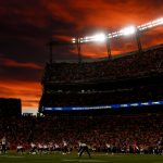 DENVER, CO - NOVEMBER 19:  The Cincinnati Bengals run an offensive play against the Denver Broncos in a general view as the sun sets at Sports Authority Field at Mile High on November 19, 2017 in Denver, Colorado. (Photo by Justin Edmonds/Getty Images)