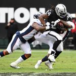 Marshawn Lynch #24 of the Oakland Raiders rushes with the ball against the Denver Broncos during their NFL game at Oakland-Alameda County Coliseum on November 26, 2017 in Oakland, California.  (Photo by Robert Reiners/Getty Images)