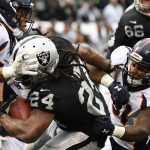 Marshawn Lynch #24 of the Oakland Raiders rushes for a touchdown against the Denver Broncos during their NFL game at Oakland-Alameda County Coliseum on November 26, 2017 in Oakland, California.  (Photo by Robert Reiners/Getty Images)