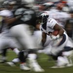 C.J. Anderson #22 of the Denver Broncos rushes up the field during the second quarter his NFL football game against the Oakland Raiders at Oakland-Alameda County Coliseum on November 26, 2017 in Oakland, California. (Photo by Stephen Lam/Getty Images)