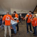 Denver Broncos longsnapper Casey Kreiter, punter Riley Dixon, and Brandon McManus post for photos with fans at Drive for Life 20.