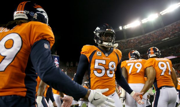 Von Miller#58 of the Denver Broncos takes the field for their game against the New England Patriots...