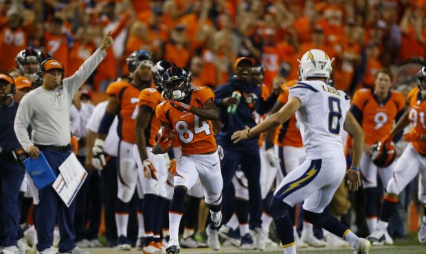 DENVER, CO - SEPTEMBER 11:  Wide receiver Isaiah McKenzie #84 of the Denver Broncos returns a kick ...