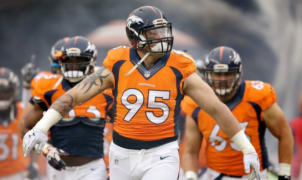 DENVER, CO - JANUARY 11:  Derek Wolfe #95 of the Denver Broncos runs onto the field during player i...