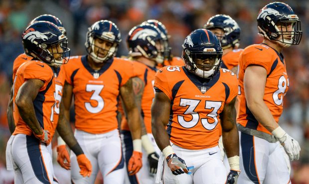 Running back De'Angelo Henderson #33 of the Denver Broncos reacts after coming up short on a third ...