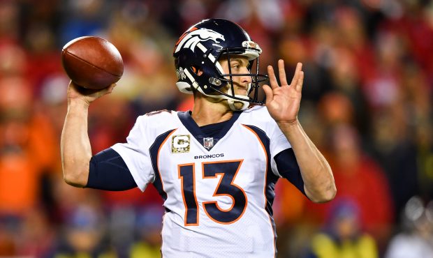 KANSAS CITY, MO - OCTOBER 30: Quarterback Trevor Siemian #13 of the Denver Broncos throws against t...