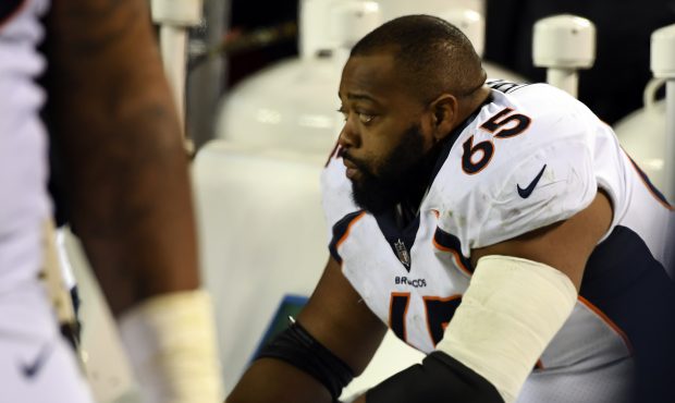 Denver Broncos offensive guard Ronald Leary (65) sits dejected not he bench in the final second aga...
