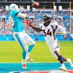 Julius Thomas #89 of the Miami Dolphins makes the catch for a touchdown in the second quarter against Will Parks #34 of the Denver Broncos at the Hard Rock Stadium on December 3, 2017 in Miami Gardens, Florida.  (Photo by Chris Trotman/Getty Images)