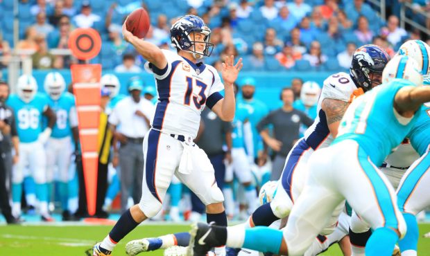MIAMI GARDENS, FL - DECEMBER 03: Trevor Siemian #13 of the Denver Broncos passes during the first q...