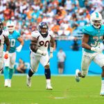Kenyan Drake #32 of the Miami Dolphins rushes in the third quarter against the Denver Broncos at the Hard Rock Stadium on December 3, 2017 in Miami Gardens, Florida.  (Photo by Chris Trotman/Getty Images)