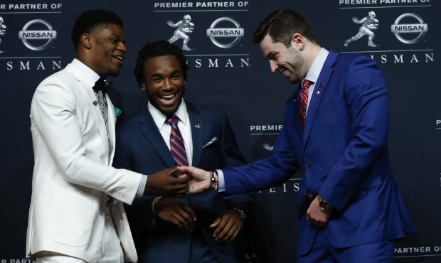 Lamar Jackson of Louisville (L), Bryce Love of Stanford and Baker Mayfield of Oklahoma attend the p...