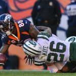 Wide receiver Demaryius Thomas #88 of the Denver Broncos is tackled by free safety Marcus Maye #26 of the New York Jets in the first quarter at Sports Authority Field at Mile High on December 10, 2017 in Denver, Colorado. (Photo by Dustin Bradford/Getty Images)