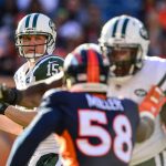 Quarterback Josh McCown #15 of the New York Jets sets to pass against the Denver Broncos in the second quarter at Sports Authority Field at Mile High on December 10, 2017 in Denver, Colorado. (Photo by Dustin Bradford/Getty Images)