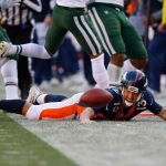 Quarterback Trevor Siemian #13 of the Denver Broncos dives for a first down during the first quarter against the New York Jets at Sports Authority Field at Mile High on December 10, 2017 in Denver, Colorado. (Photo by Justin Edmonds/Getty Images)