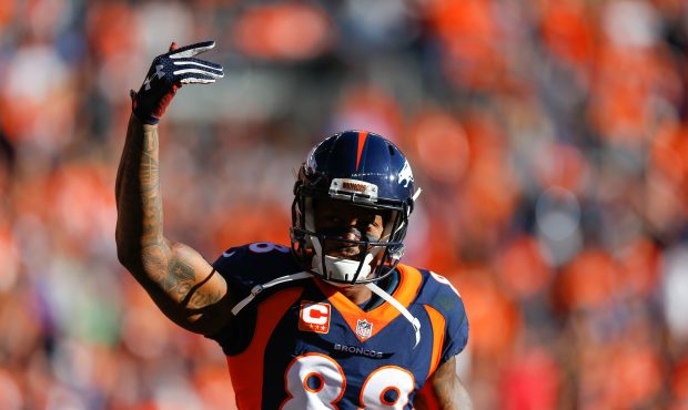 Wide receiver Demaryius Thomas #88 of the Denver Broncos pumps up the crowd after scoring a first q...