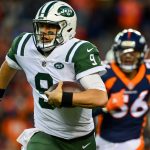 Quarterback Bryce Petty #9 of the New York Jets carries the ball under coverage by outside linebacker Shane Ray #56 of the Denver Broncos in the fourth quarter of a game at Sports Authority Field at Mile High on December 10, 2017 in Denver, Colorado. (Photo by Dustin Bradford/Getty Images)