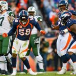 Outside linebacker Von Miller #58 of the Denver Broncos celebrates along with Shelby Harris #96 and Leonard Williams #92 after a sack against the New York Jets in the third quarter of a game at Sports Authority Field at Mile High on December 10, 2017 in Denver, Colorado. (Photo by Dustin Bradford/Getty Images)