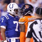 Jacoby Brissett #7 of the Indianapolis Colts talks with Brandon Marshall #54 of the Denver Broncos after a touchdown during the first half at Lucas Oil Stadium on December 14, 2017 in Indianapolis, Indiana.  (Photo by Joe Robbins/Getty Images)