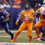 C.J. Anderson #22 of the Denver Broncos runs with the ball against the Indianapolis Colts during the first half at Lucas Oil Stadium on December 14, 2017 in Indianapolis, Indiana.  (Photo by Joe Robbins/Getty Images)