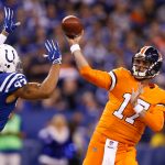 Brock Osweiler #17 of the Denver Broncos throws a pass under pressure from Jabaal Sheard #93 of the Indianapolis Colts during the first half at Lucas Oil Stadium on December 14, 2017 in Indianapolis, Indiana.  (Photo by Michael Reaves/Getty Images)