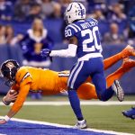 Brock Osweiler #17 of the Denver Broncos dives into the end zone for a touchdown against the Indianapolis Colts during the first half at Lucas Oil Stadium on December 14, 2017 in Indianapolis, Indiana.  (Photo by Andy Lyons/Getty Images)