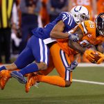 Demaryius Thomas #88 of the Denver Broncos is tackled by Quincy Wilson #31 of the Indianapolis Colts during the first half at Lucas Oil Stadium on December 14, 2017 in Indianapolis, Indiana.  (Photo by Joe Robbins/Getty Images)