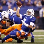 Jacoby Brissett #7 of the Indianapolis Colts tries to throw a pass as he is tackled by Von Miller #58 of the Denver Broncos during the second half at Lucas Oil Stadium on December 14, 2017 in Indianapolis, Indiana.  (Photo by Andy Lyons/Getty Images)