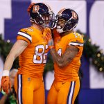 Jeff Heuerman #82 of the Denver Broncos celebrates with Cody Latimer #14 after a touchdown against the Indianapolis Colts during the second half at Lucas Oil Stadium on December 14, 2017 in Indianapolis, Indiana.  (Photo by Joe Robbins/Getty Images)