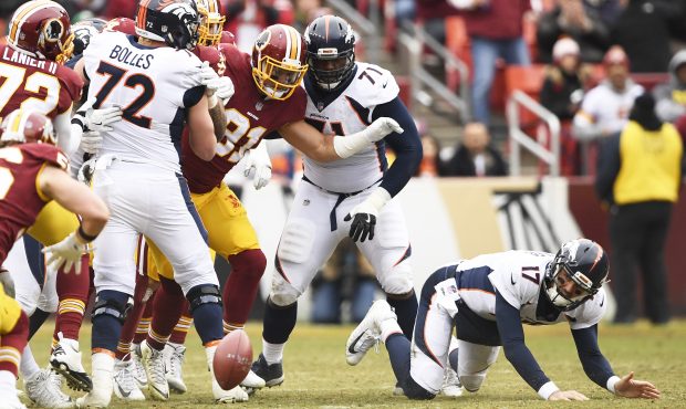 Denver Broncos quarterback Brock Osweiler (17) fumbles in the second quarter as they take on the Wa...