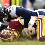 Quarterback Kirk Cousins #8 of the Washington Redskins is sacked by outside linebacker Von Miller #58 of the Denver Broncos in the second quarter at FedExField on December 24, 2017 in Landover, Maryland. (Photo by Patrick McDermott/Getty Images)