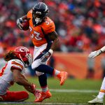 Running back De'Angelo Henderson #33 of the Denver Broncos avoids a tackle before scoring a second quarter touchdown against the Kansas City Chiefs at Sports Authority Field at Mile High on December 31, 2017 in Denver, Colorado. (Photo by Dustin Bradford/Getty Images)