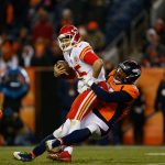 Quarterback Patrick Mahomes #15 of the Kansas City Chiefs is sacked by defensive end DeMarcus Walker #57 of the Denver Broncos during the fourth quarter at Sports Authority Field at Mile High on December 31, 2017 in Denver, Colorado. The Chiefs defeated the Broncos 27-24. (Photo by Justin Edmonds/Getty Images)