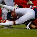 Quarterback Paxton Lynch #12 of the Denver Broncos fumbles the football during the third quarter against the Kansas City Chiefs at Sports Authority Field at Mile High on December 31, 2017 in Denver, Colorado. The Chiefs defeated the Broncos 27-24. (Photo by Justin Edmonds/Getty Images)