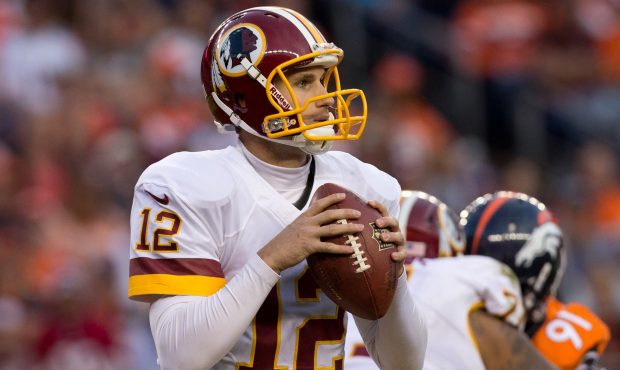 DENVER, CO - OCTOBER 27:  Quarterback Kirk Cousins #12 of the Washington Redskins in action against...