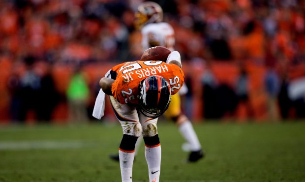 DENVER, CO - OCTOBER 27:  Cornerback Chris Harris #25 of the Denver Broncos takes a bow for the cro...
