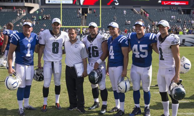 (L-R) Pat McAfee #1 of the Indianapolis Colts, Donnie Jones #8 of the Philadelphia Eagles, Tom McMa...