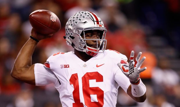 Quarterback J.T. Barrett #16 of the Ohio State Buckeyes looks to pass against the Wisconsin Badgers...