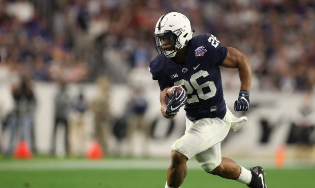 Running back Saquon Barkley #26 of the Penn State Nittany Lions rushes the football against the Was...