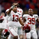 Tua Tagovailoa #13 of the Alabama Crimson Tide celebrates beating the Georgia Bulldogs in overtime to win the CFP National Championship presented by AT&T at Mercedes-Benz Stadium on January 8, 2018 in Atlanta, Georgia.  (Photo by Jamie Squire/Getty Images)