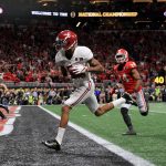 DeVonta Smith #6 of the Alabama Crimson Tide catches a 41 yard touchdown pass to beat the Georgia Bulldogs in the CFP National Championship presented by AT&T in overtime at Mercedes-Benz Stadium on January 8, 2018 in Atlanta, Georgia.  (Photo by Mike Ehrmann/Getty Images)